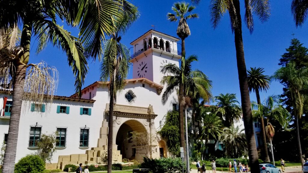 Santa Barbara County Courthouse Spanish Colonial architecture and clock tower framed by palm trees